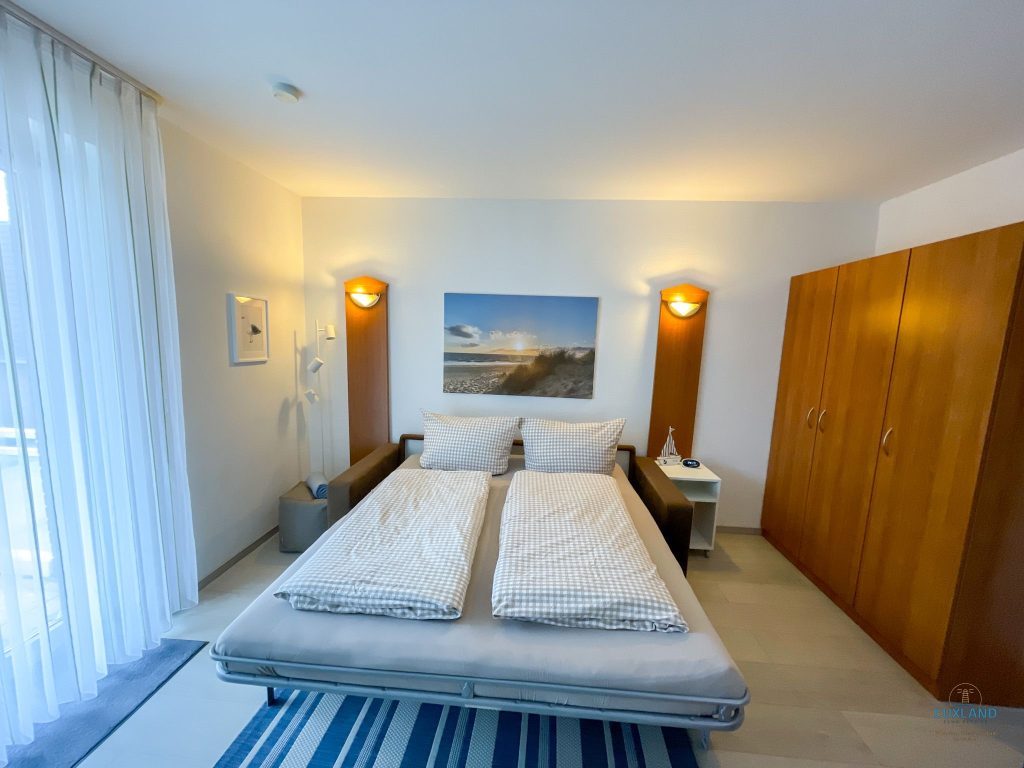 Cuxland-Fewo-Service-Residenz Kormoran-Wohnung 1.06.-Wohn/Schlafraum