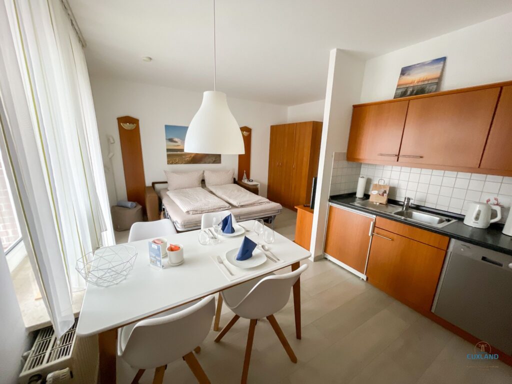 Cuxland-Fewo-Service-Residenz Kormoran-Wohnung 01.06.-Wohn/Schlafraum