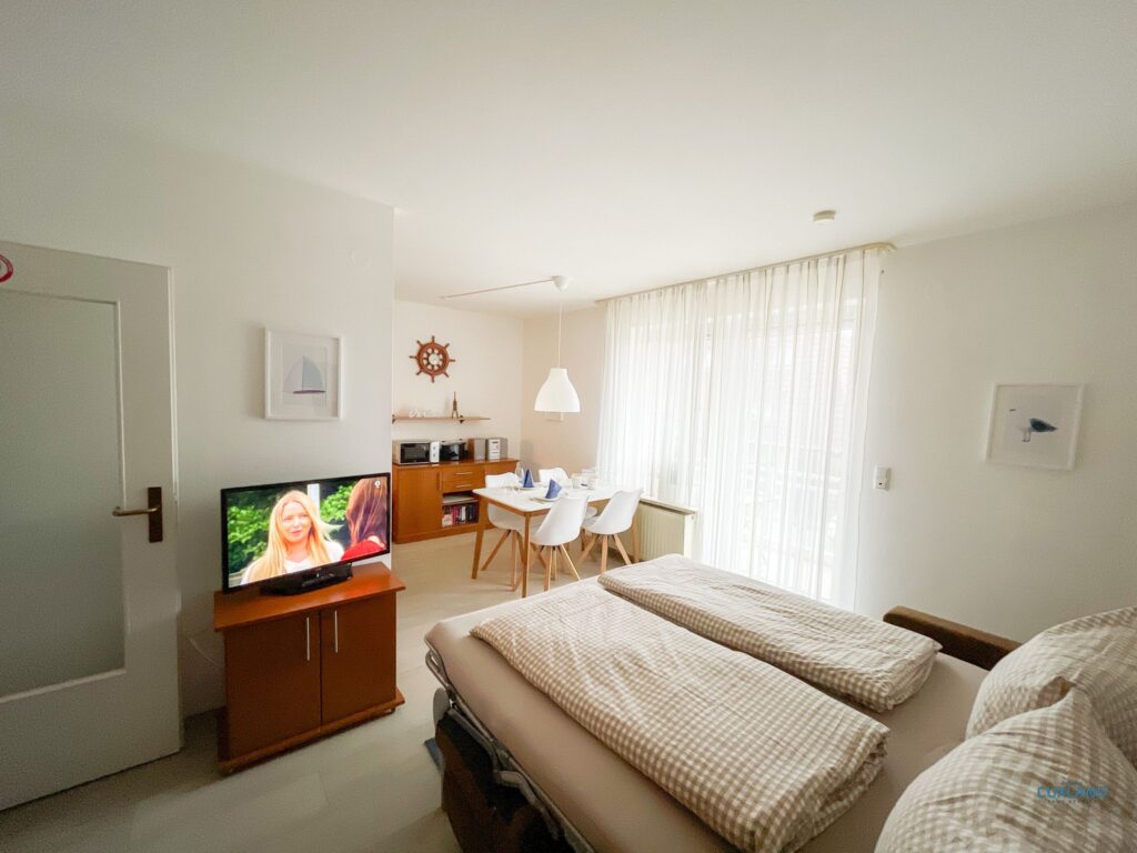 Cuxland-Fewo-Service-Residenz Kormoran-Wohnung 01.06.-Wohn/Schlafraum