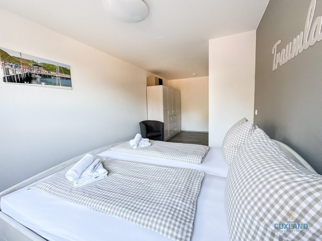 Cuxland-Fewo-Service-Haus Nordseebrandung-Wohnung 2.4-Schlafzimmer