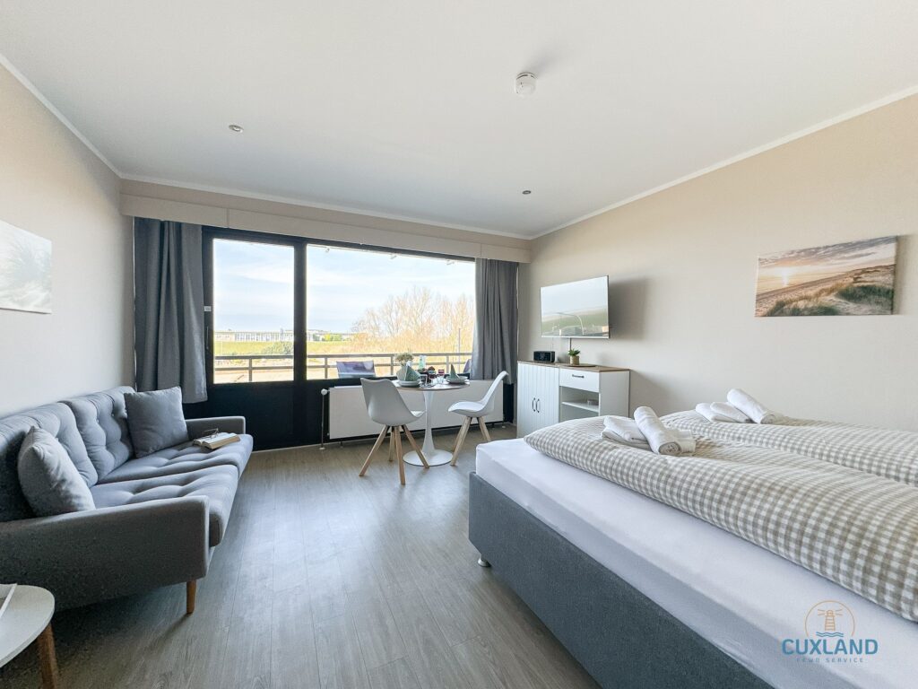 Cuxland-Fewo-Service-Haus Jan am Strand-Wohnung 204-Wohn/Schlafraum